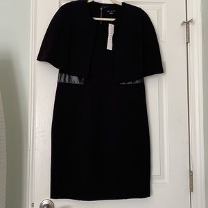 TRIBAL sleeveless black dress with removable shoulder cape. New with tags.